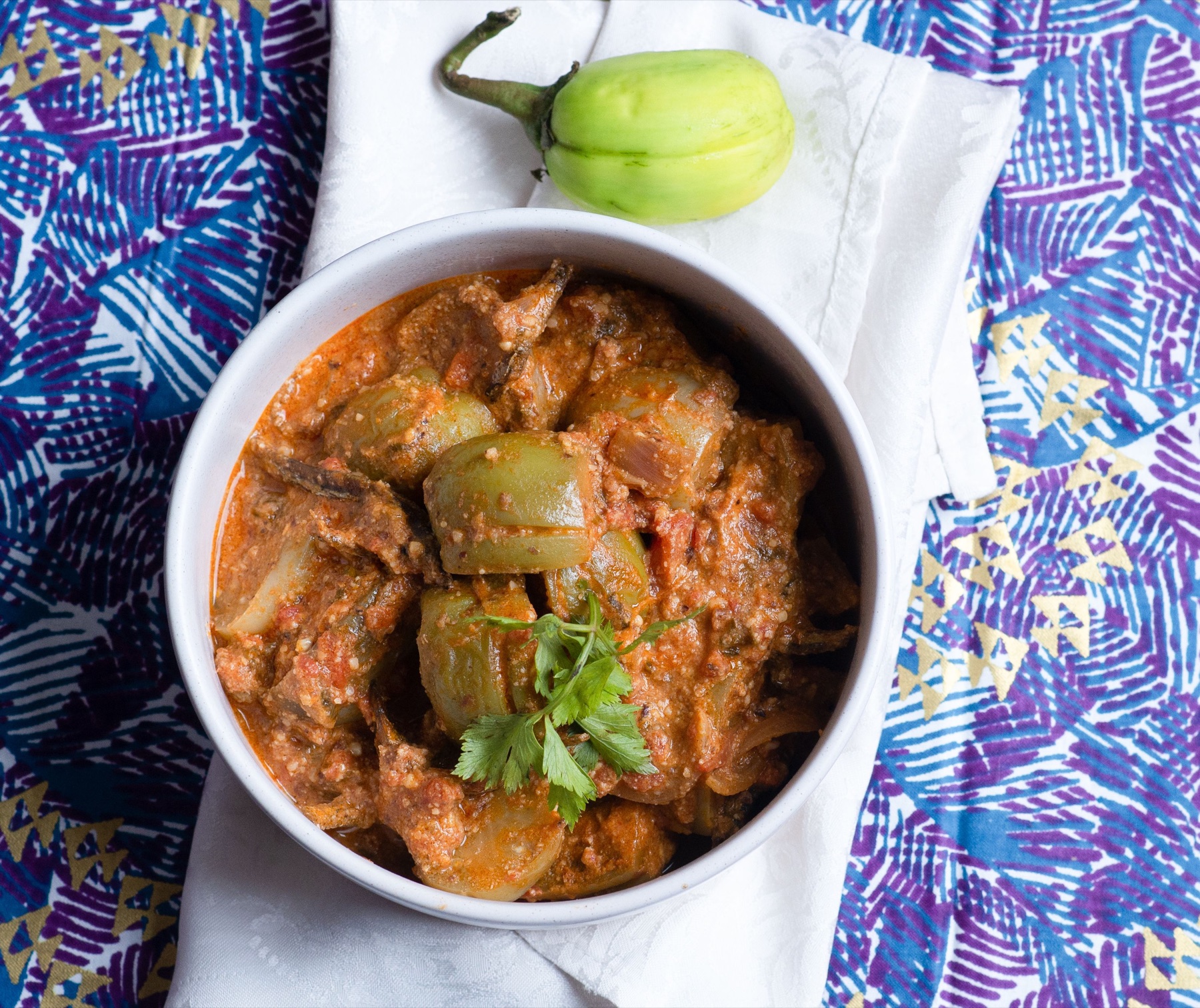 A rich West African garden egg stew served in a bowl